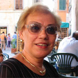 Maria Marina Tuzza helps her sons Fabbrizio and Pier Giorgio in their bar, Caffè del Commercio