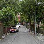 Modern two-way streets, like Via G. Pascoli, pave the way through New Cagli