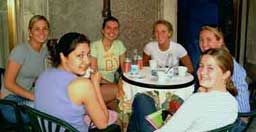 Ellen, Sarah, Meghan, Suzanne, Diana, and Devon relax with cappuccinos