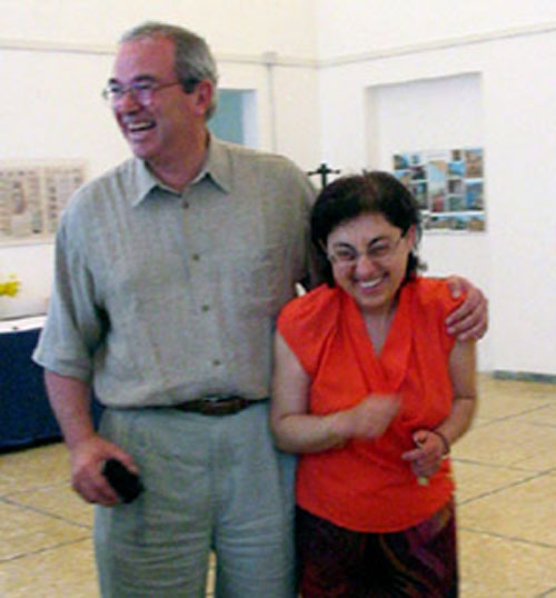 Maximillan Lurz embraces Professor Cristina Antoinucci on his last day at The Atrium.