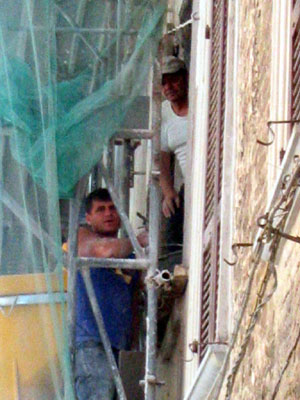 Construction workers, high in the scaffolding around the buildings, are a frequent sight around Cagli.