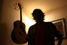 Silhouette of Giacconi and guitar