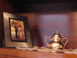 Family photos and small knicknacks decorate every shelf of her house