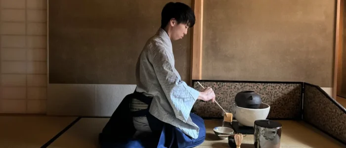 3Teamaster A tea master prepares tea in a traditional tea room with